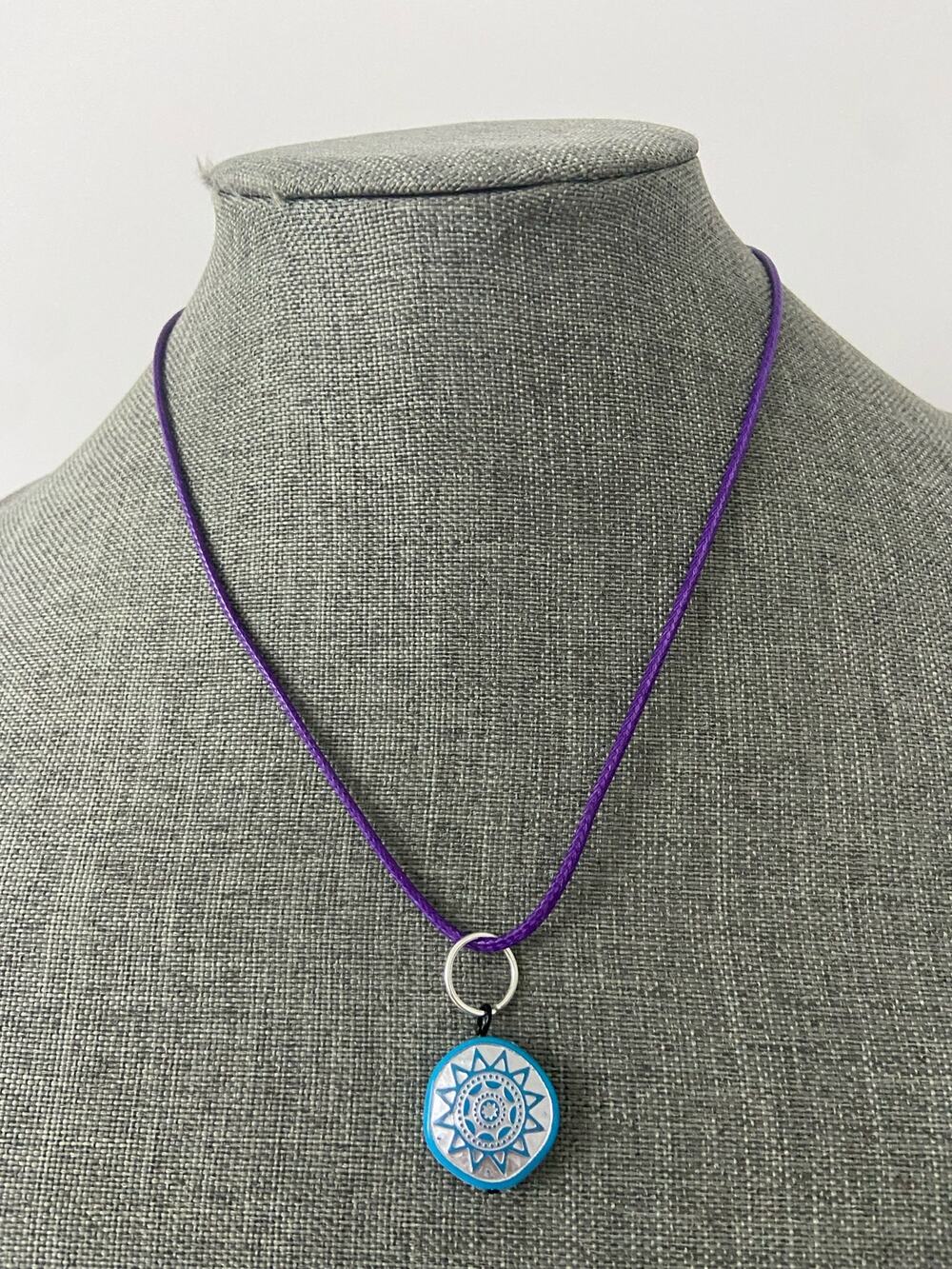 Blue sun pendant necklace